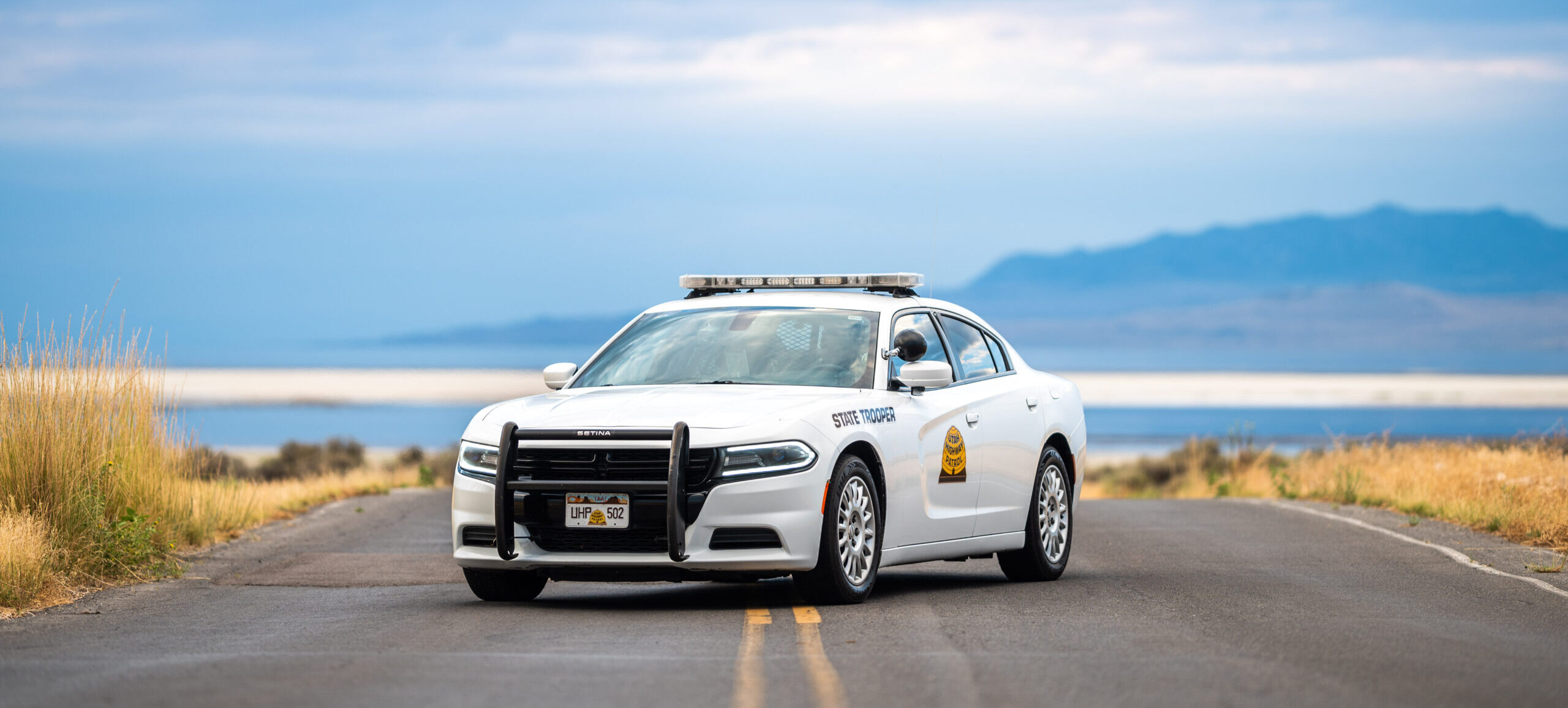 UHP Dodge Charger positioned on the road with the Great Salt Lake in the background